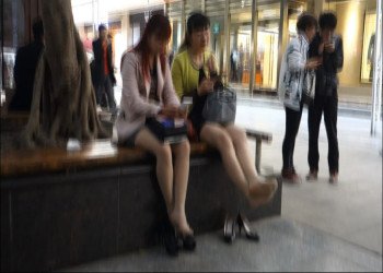 A couple of ladies show off hot legs